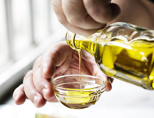 Olive oil being poured