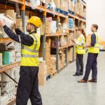 Warehouse,Worker,Taking,Package,In,The,Shelf,In,A,Large