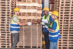 Black,African,Male,Worker,Walking,With,Co-workers,,Female,Worker,Shaking