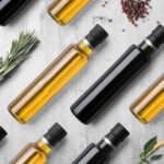 Oil,Vinegar,Bottles,Composition,Mockup,On,White,Wooden,Background,,With